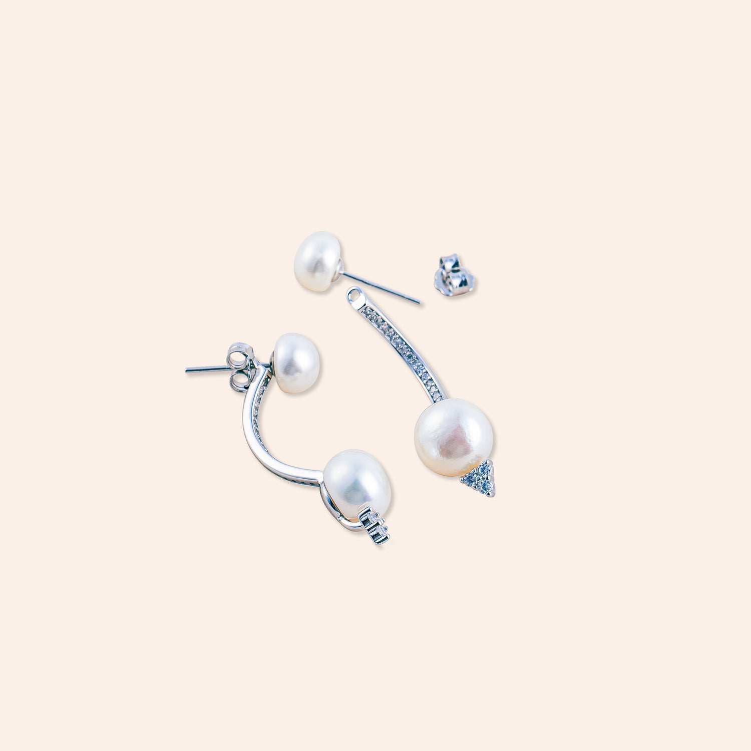 CELESTIA PEARL ARC STUDS