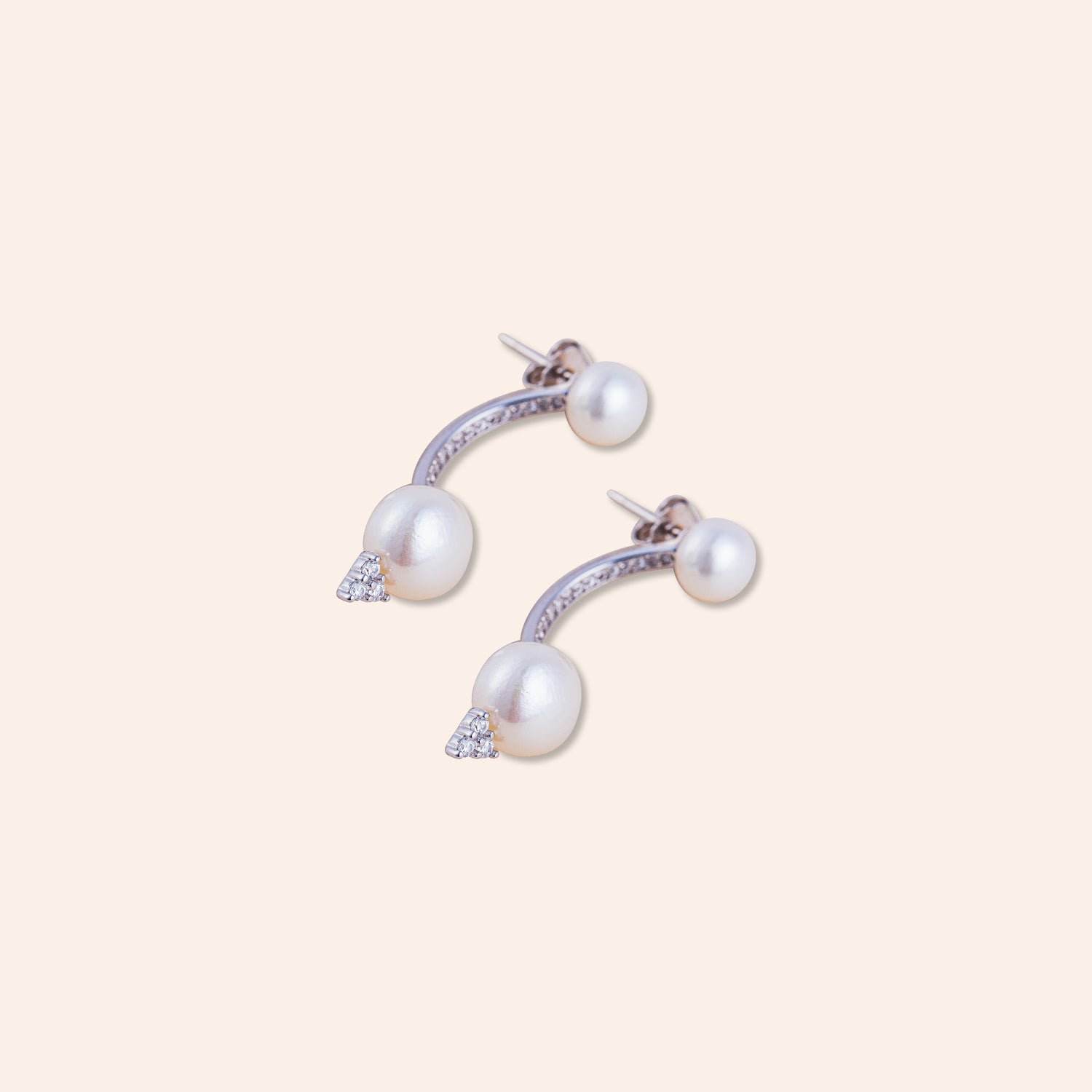 CELESTIA PEARL ARC STUDS
