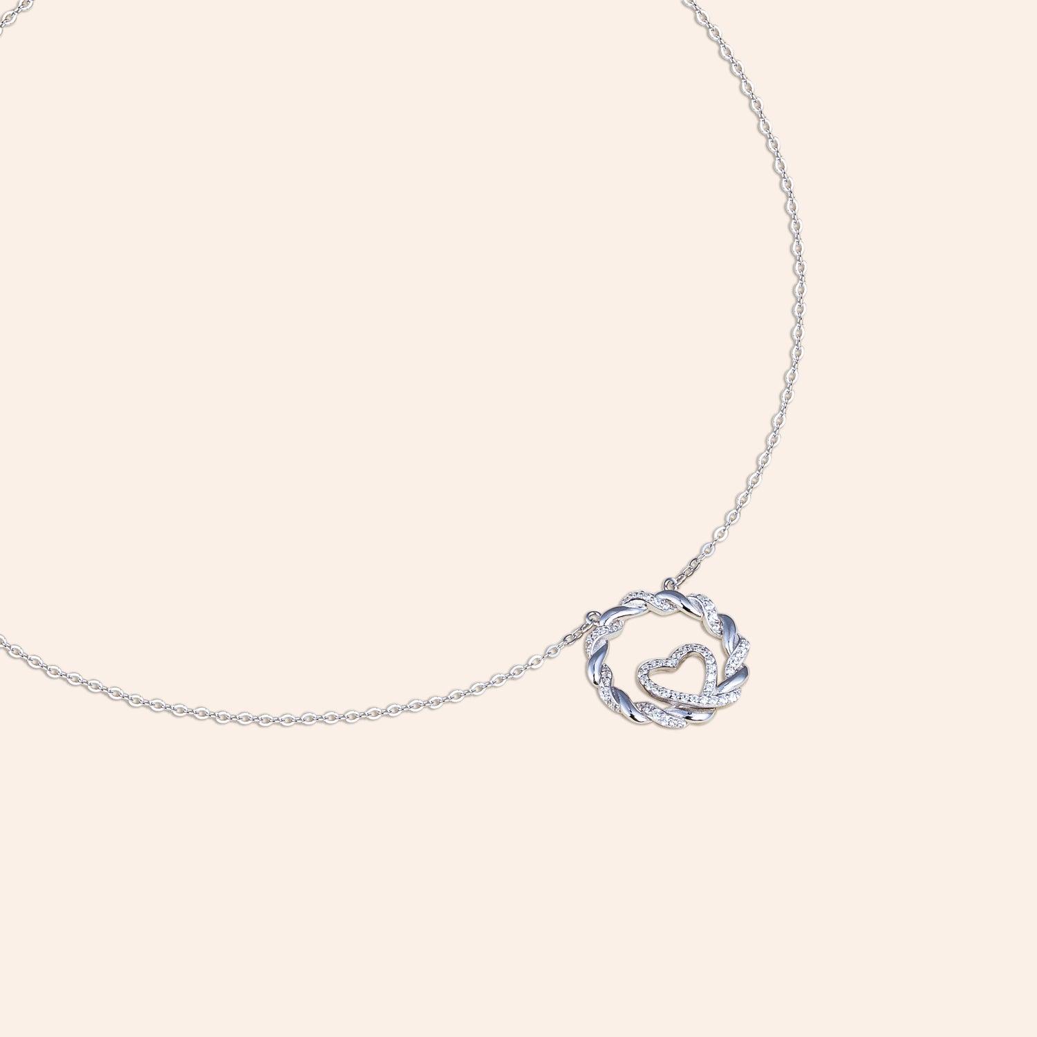 WOVEN HEART NECKLACE